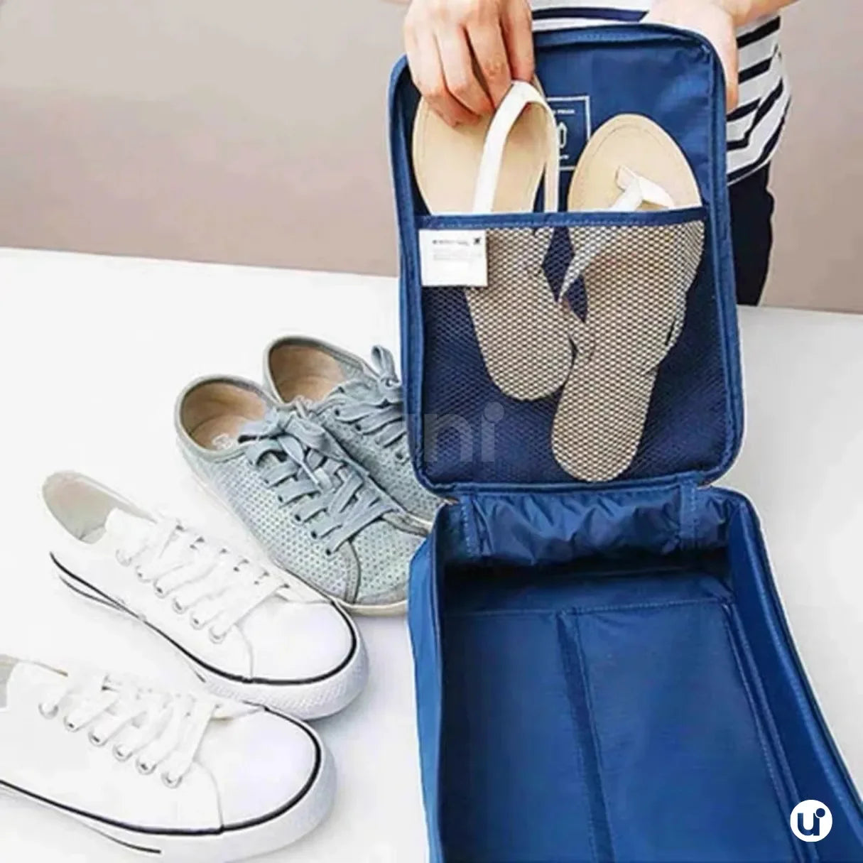Organizador de sapatos de viagem impermeável da UniEscolhas, com design elegante em tecido Oxford premium, ideal para proteger calçados dentro da mala.