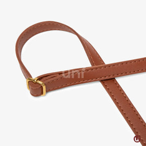 Bolsa de lona feminina Le Classique com alças de ombro e detalhes em couro sintético, com design elegante e versátil para o dia a dia e viagens curtas.