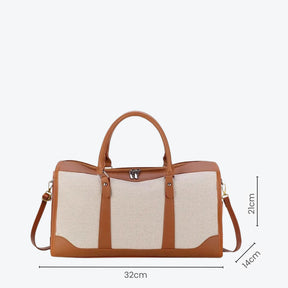 Bolsa de lona feminina Le Classique com alças de ombro e detalhes em couro sintético, com design elegante e versátil para o dia a dia e viagens curtas.