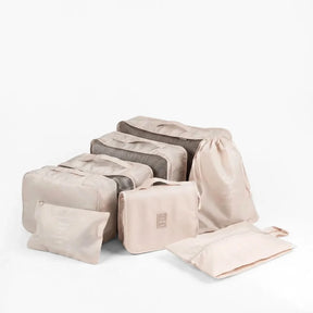 Kit organizador de mala VibePack contendo bolsas de diferentes tamanhos para roupas, sapatos e cosméticos, ideal para manter a bagagem feminina perfeitamente arrumada.