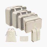 Kit organizador de mala VibePack contendo bolsas de diferentes tamanhos para roupas, sapatos e cosméticos, ideal para manter a bagagem feminina perfeitamente arrumada.