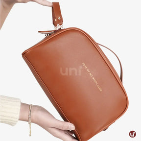 Necessaire de maquiagem feminina Luxbag 2.0 em couro PU premium impermeável, com design elegante e alça de mão, ideal para organizar cosméticos com sofisticação em viagens.