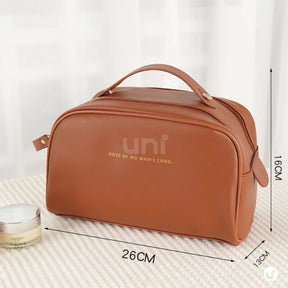 Necessaire de maquiagem feminina Luxbag 2.0 em couro PU premium impermeável, com design elegante e alça de mão, ideal para organizar cosméticos com sofisticação em viagens.