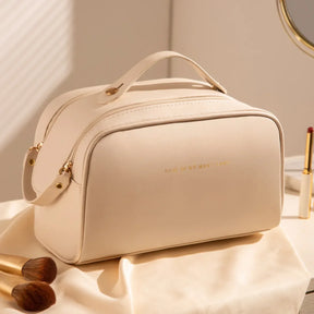 Necessaire de maquiagem feminina Luxbag 2.0 em couro PU premium impermeável, com design elegante e alça de mão, ideal para organizar cosméticos com sofisticação em viagens.