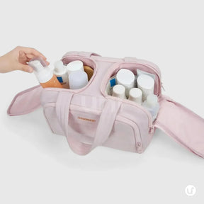 Nécessaire feminina grande CrushBag em tecido impermeável semibrilhante, com design elegante inspirado em nuvens, ideal para organizar itens de viagem com sofisticação.