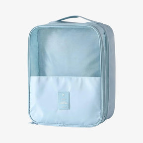 Organizador de sapatos de viagem impermeável da UniEscolhas, com design elegante em tecido Oxford premium, ideal para proteger calçados dentro da mala.